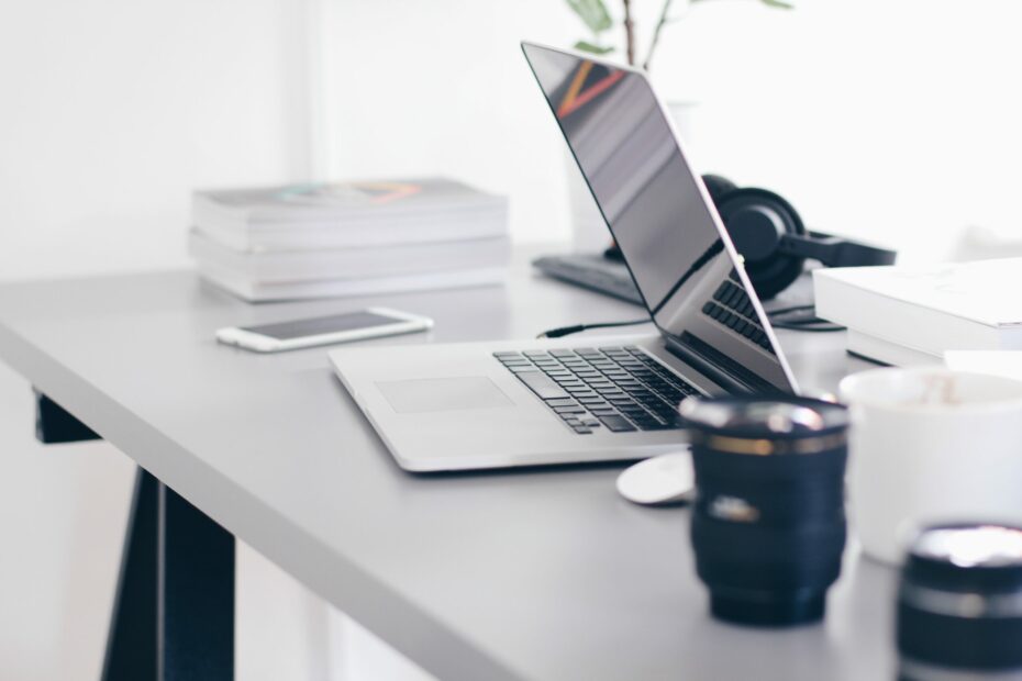 Free Gray Laptop on Table Top Stock Photo